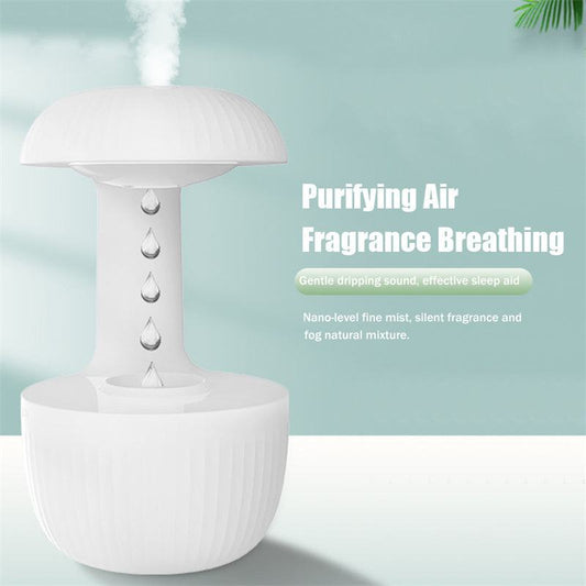 Anti-gravity air humidifier with levitating water droplets and cool mist on white background