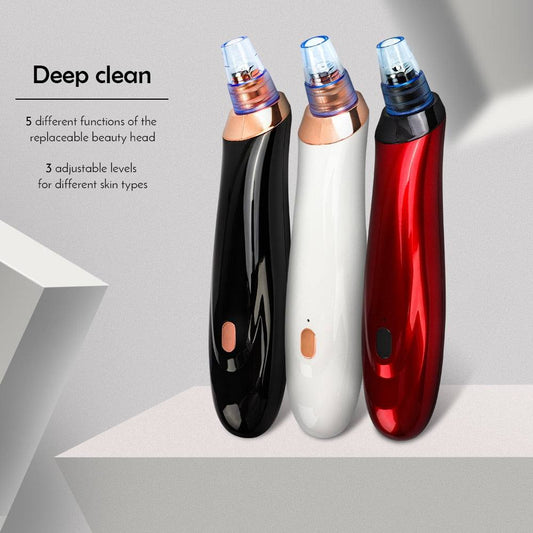 Electric blackhead instrument with multiple nozzle heads for acne and pore cleaning