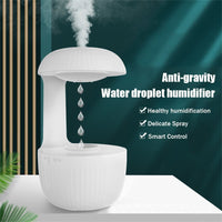 Anti-gravity air humidifier with levitating water droplets and cool mist on white background