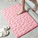 Embossed microfiber pebble bath mat with anti-slip backing for soft, absorbent, and safe home use